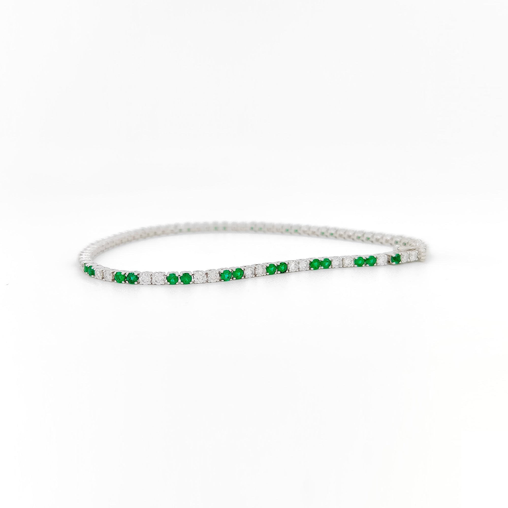 Emerald and Diamond tennis bracelet 18K White Gold
